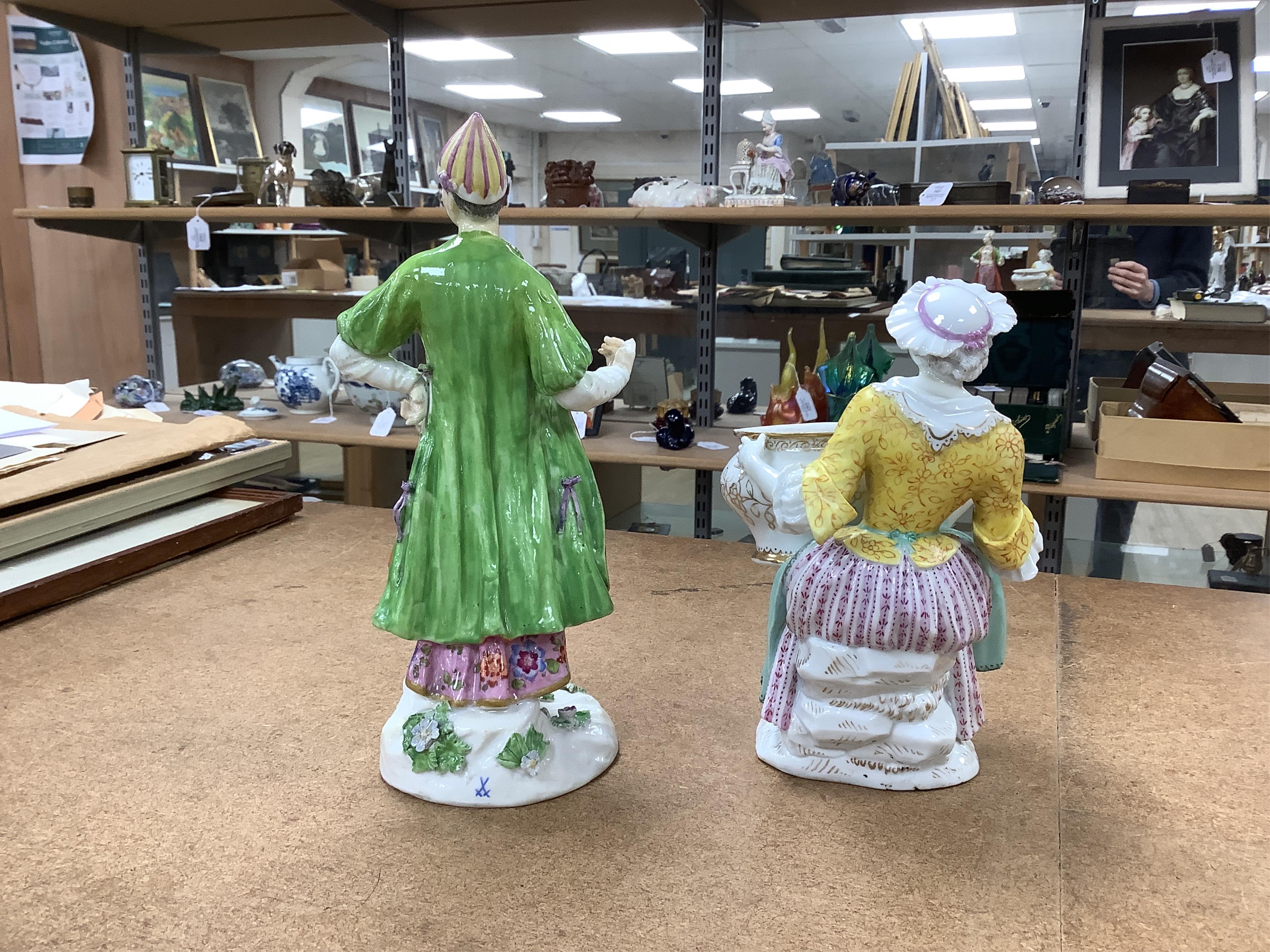 A group of various ceramics to include a Berlin floral decorated vase, a pair of Meissen dishes, similar box and cover, figural sweetmeat and figure of a Turk, together with a pair of Japanese Imari dishes, tallest 33cm.